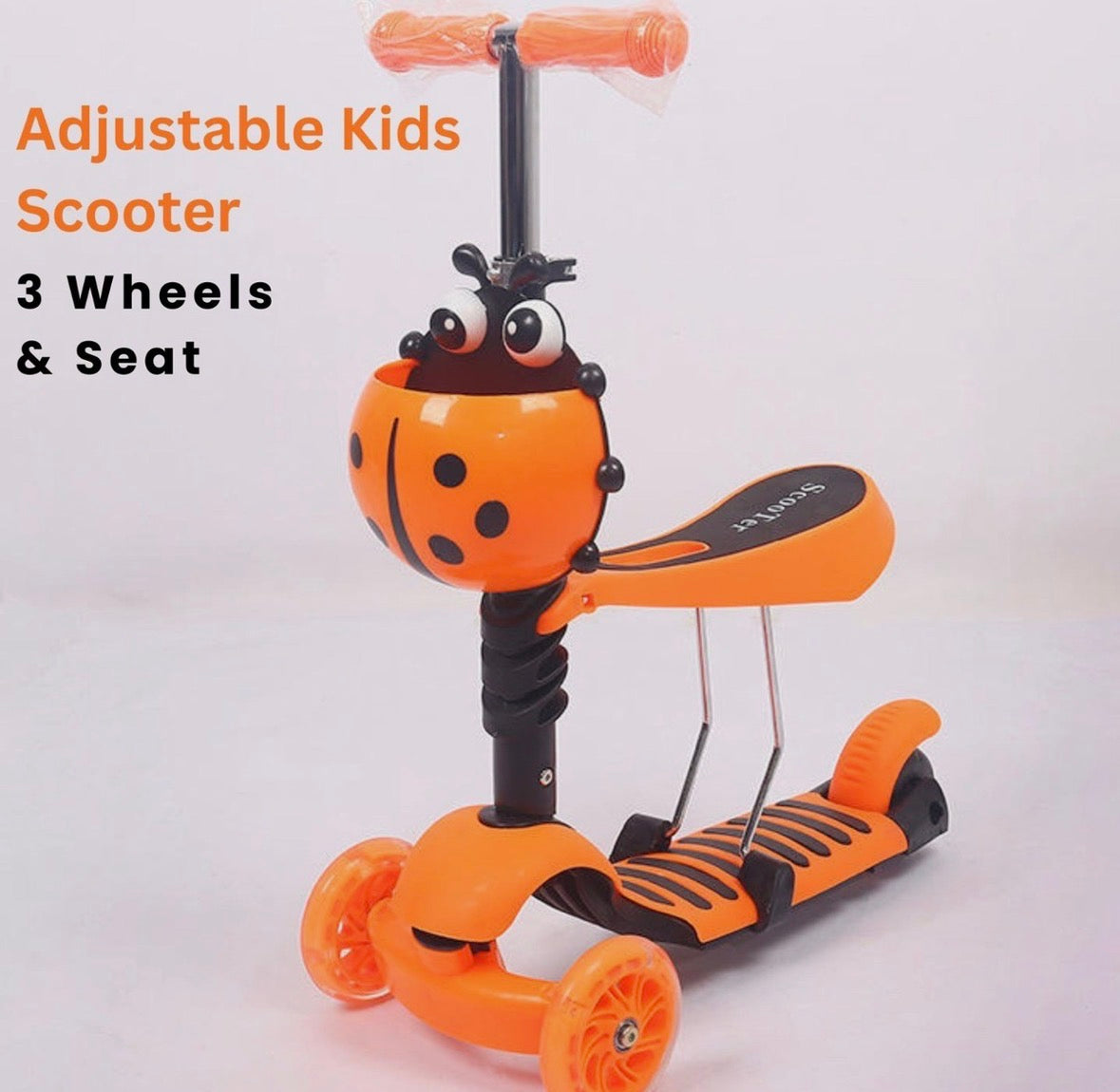 Orange kids scooter with a ladybug design on a white background